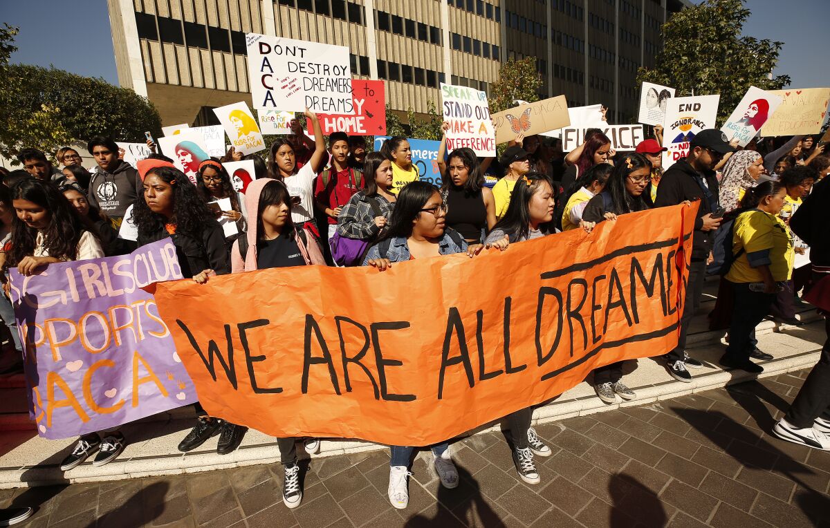 Advocacy immigrant berman simmons behalf curtis honored refugees immigrants bono alicia